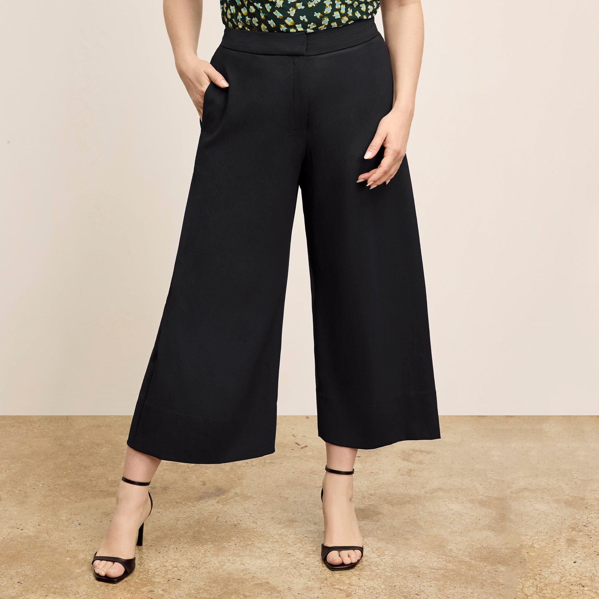 Front image of a woman wearing the Zhou Culotte - Eco Soft Wave :: Black 