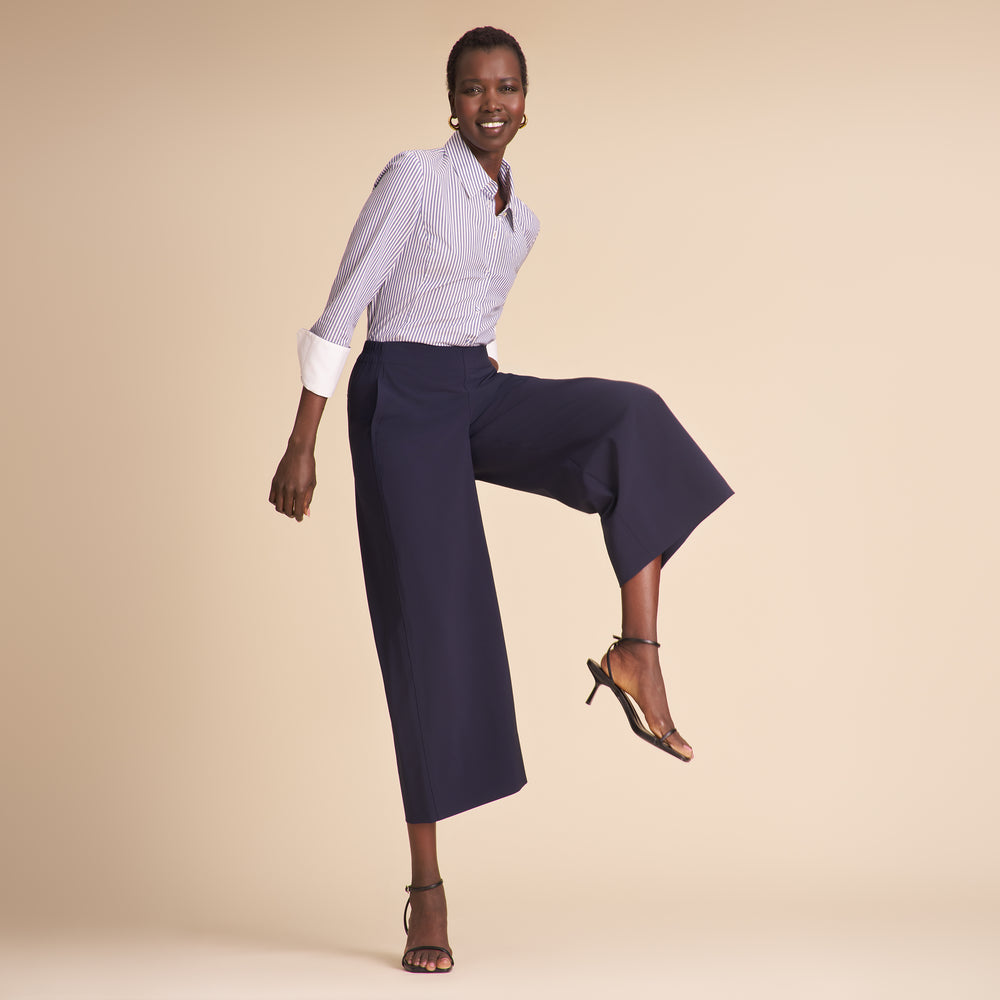 front image of a woman wearing the elena pants in dark navy