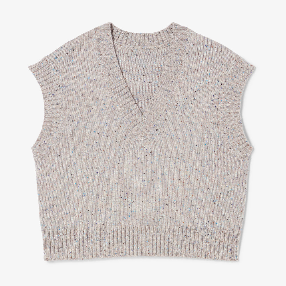 Beige knitted vest on a white background