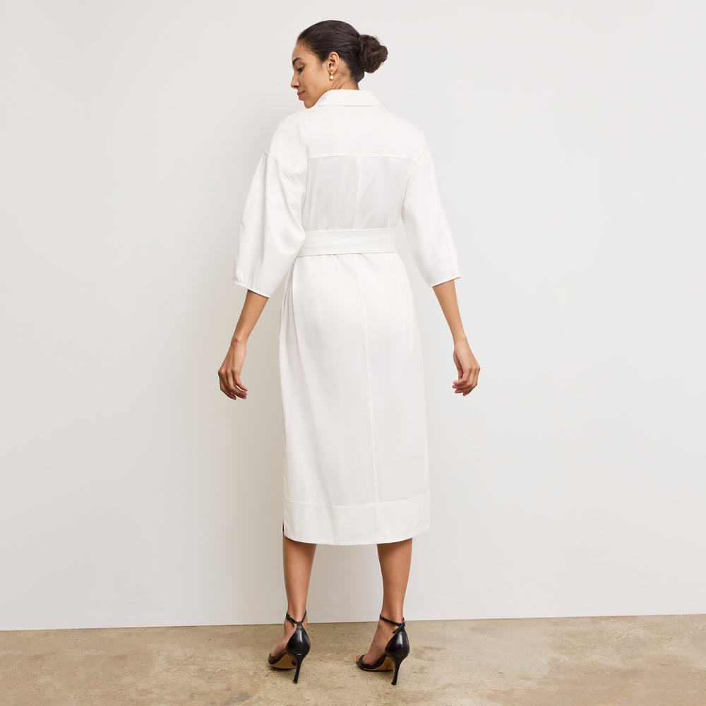 Back image of a woman wearing the Fanfan Dress in White