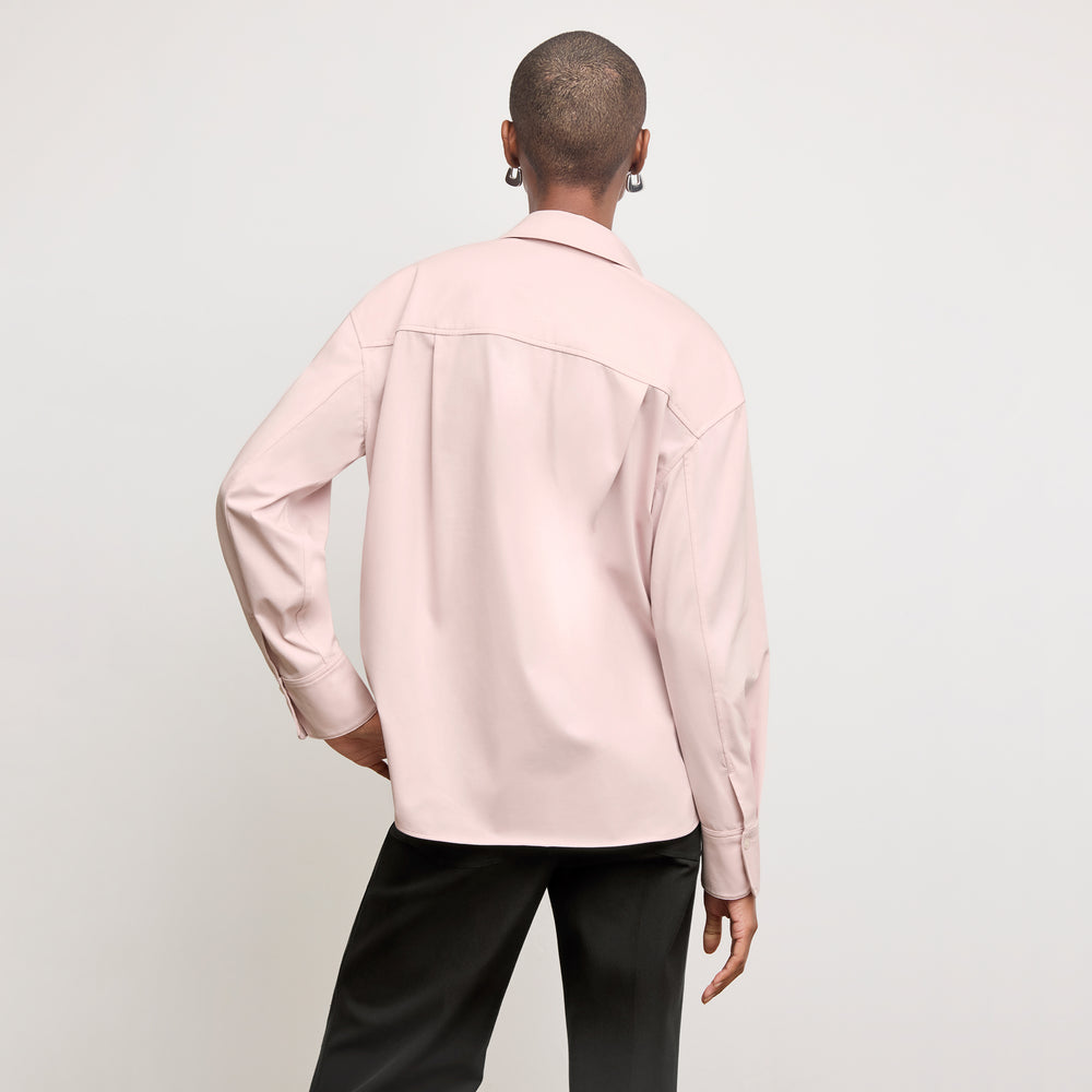 back image of a woman wearing the filomina top in tulip