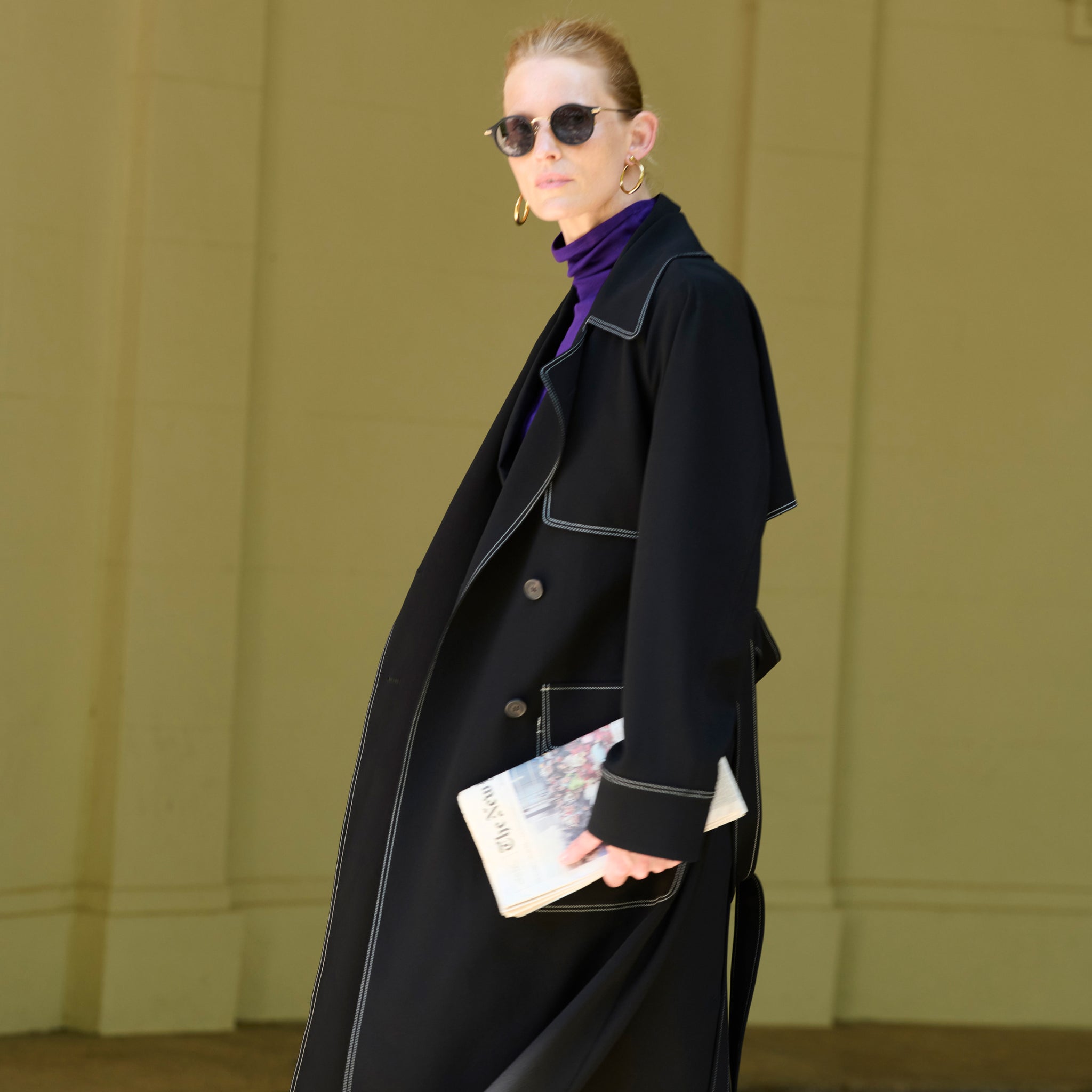 front image of a woman wearing the frankie jacket in black