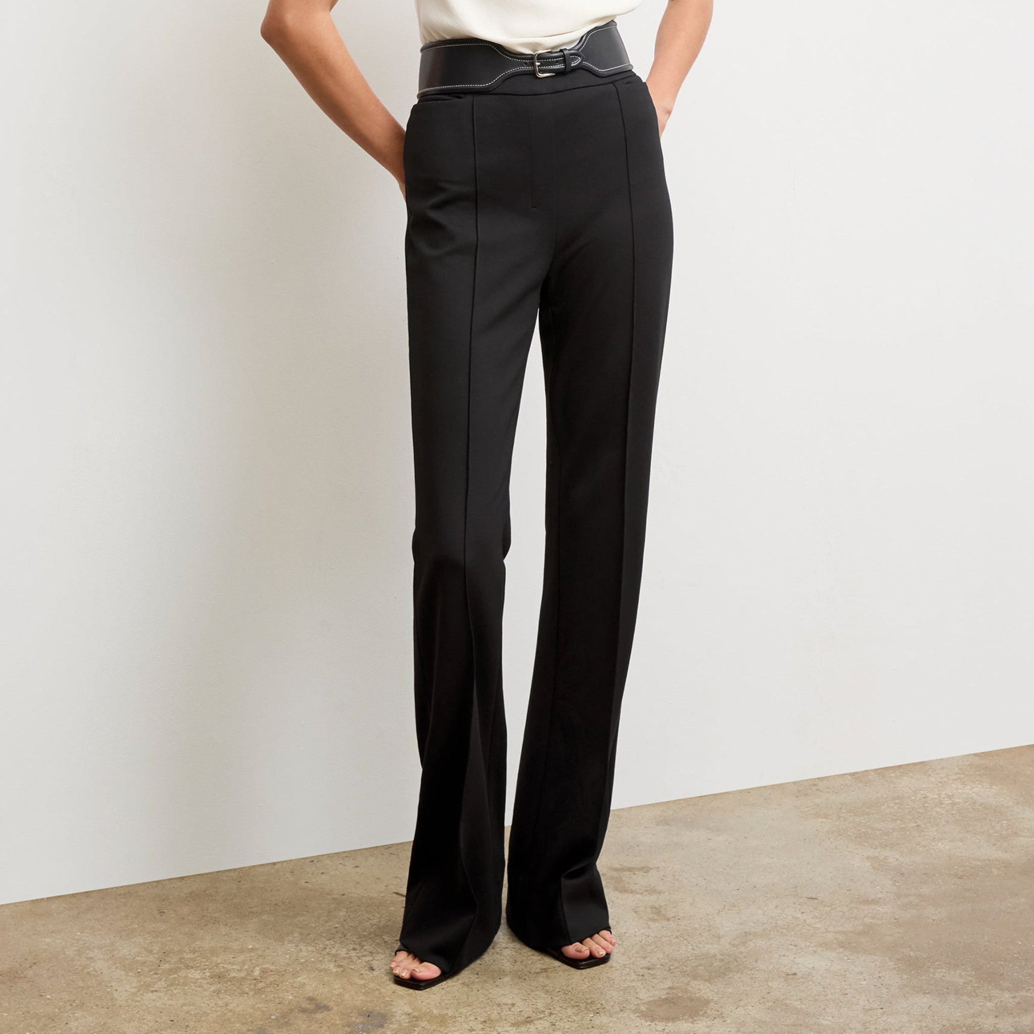 Front image of a woman wearing the hart pant in black 