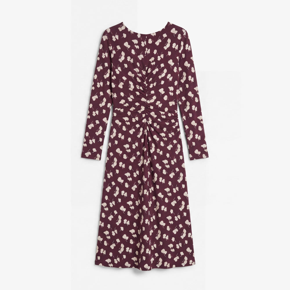 A long-sleeve midi dress in a deep burgundy or plum color with an all-over small cream floral print, shown flat against a light gray background.