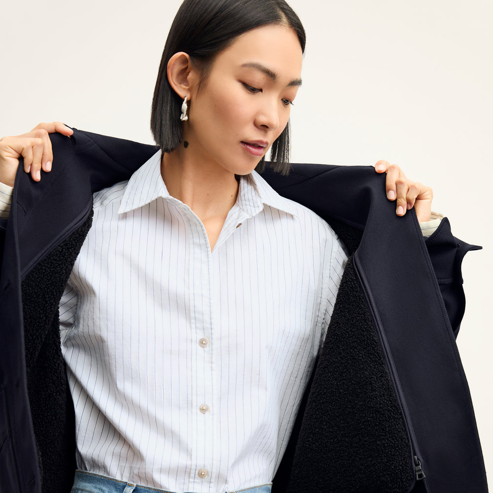Front image of a woman wearing the Mila Button Down - Poplin Stripe in Blue / Ivory