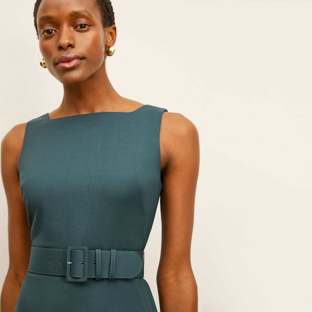 front image of a woman wearing the cynthia dress in blue jade