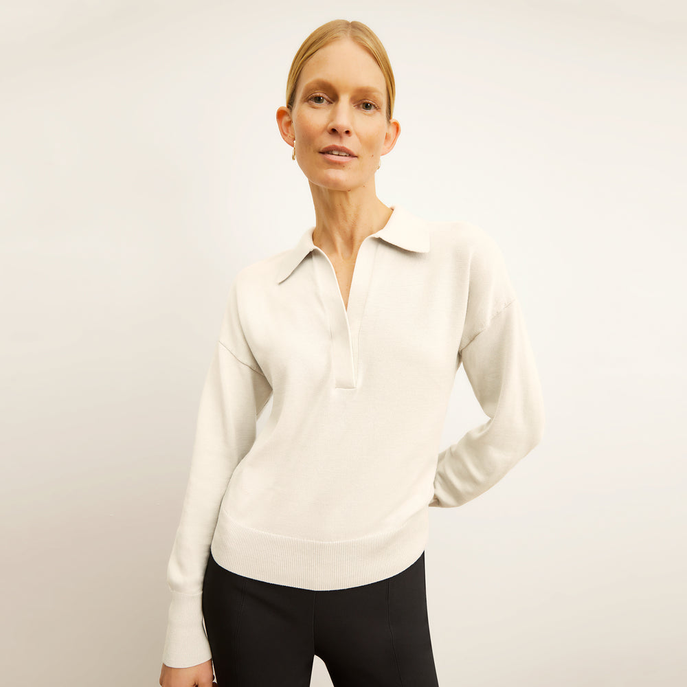 Front image of a woman wearing the Leo Pullover