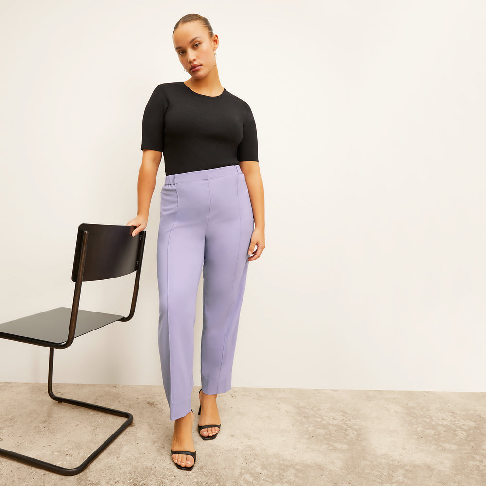front image of a woman wearing the colby pants in light orchid