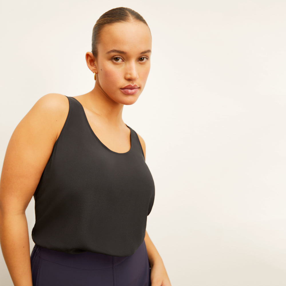 Front image of a woman wearing the Vicky Tank in Black