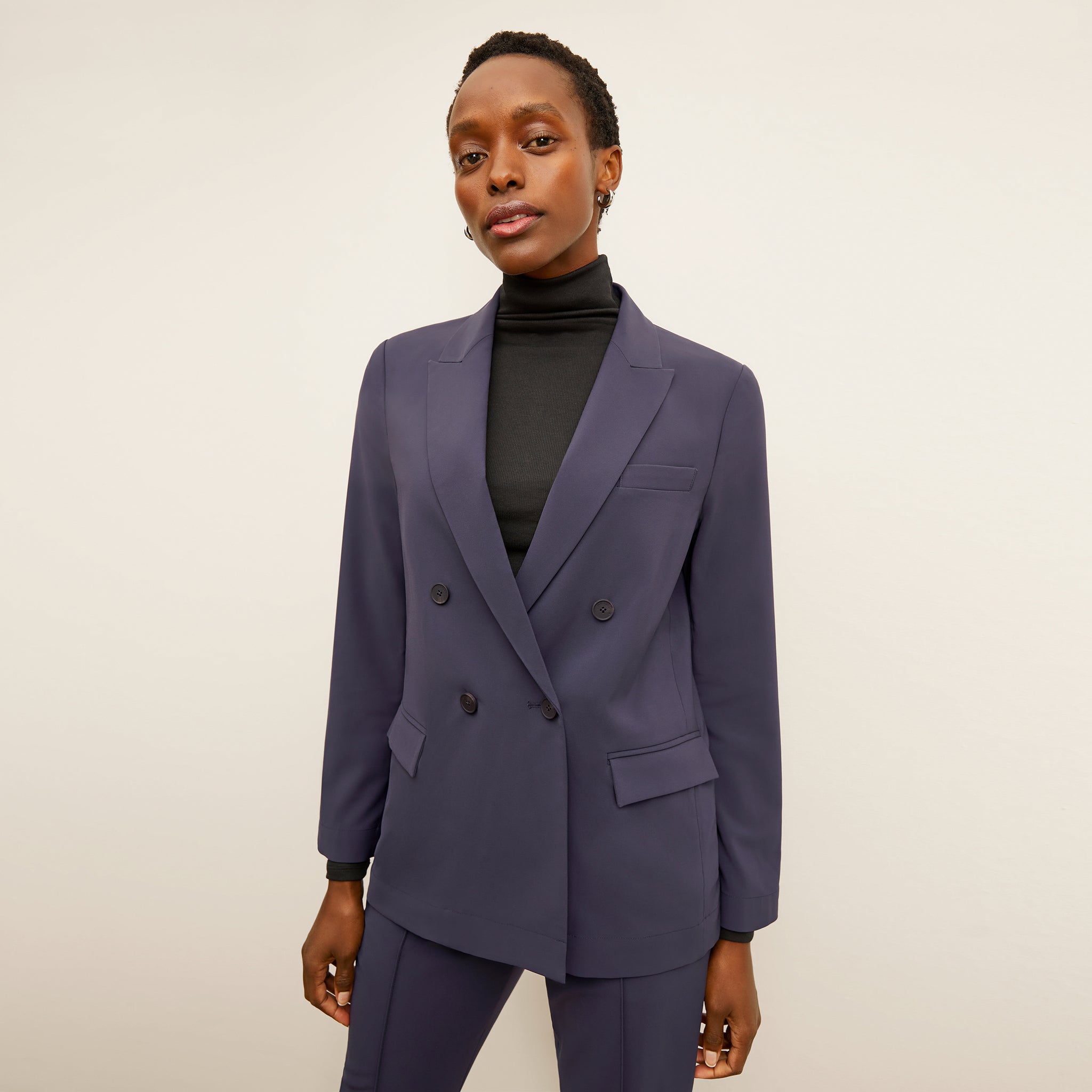 Front image of a woman wearing the O'Hara Blazer 
