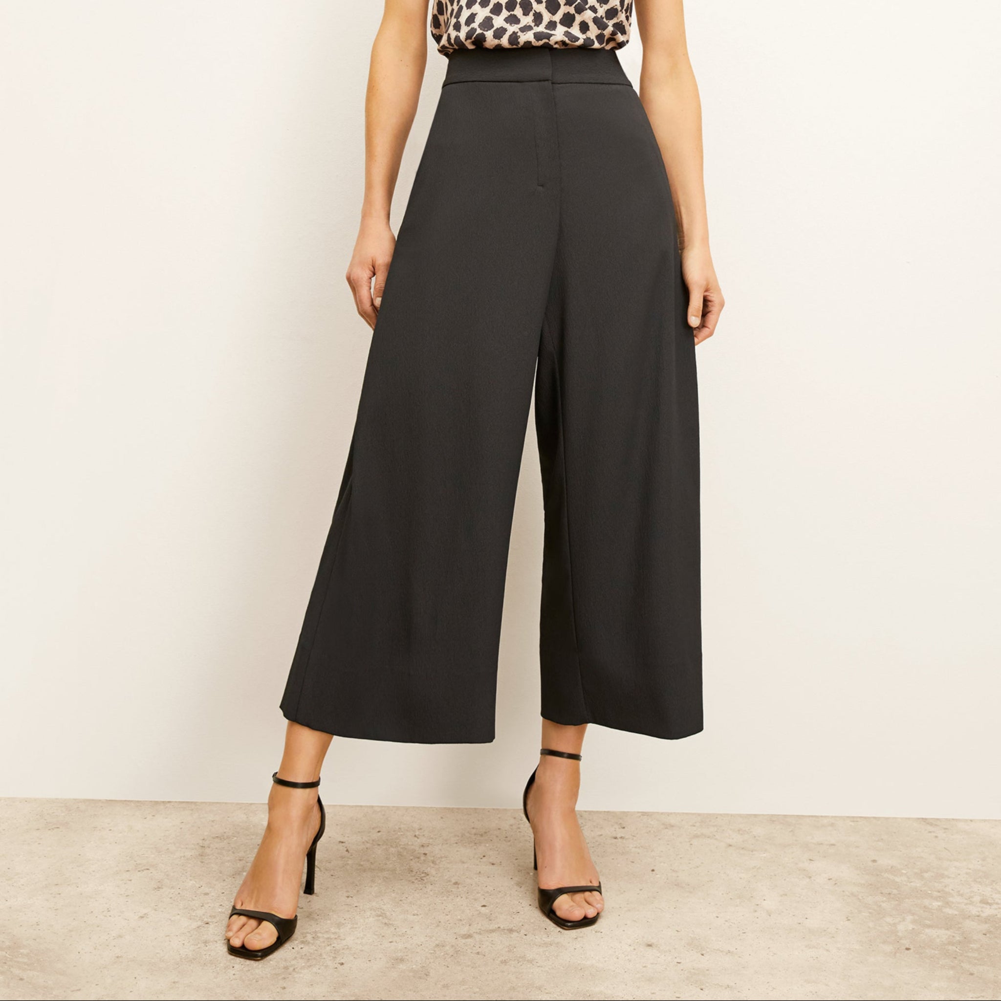 Front image of a woman wearing the Zhou Culotte - Eco Heavy Soft Wave :: Black 