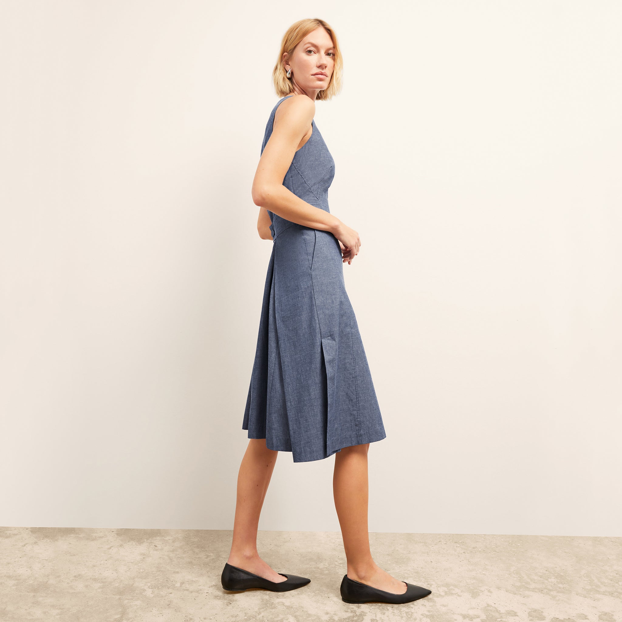 side image of the estela dress in clear blue