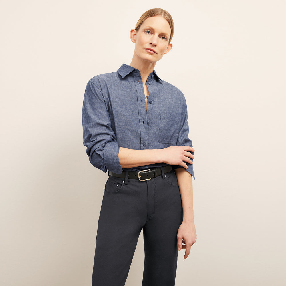 front image of a woman wearing the siobhan top in clear blue