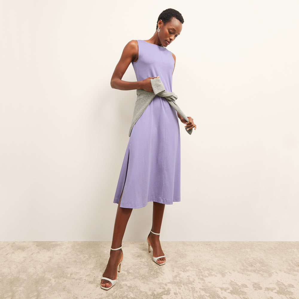 front image of a woman wearing the milano dress in light orchid