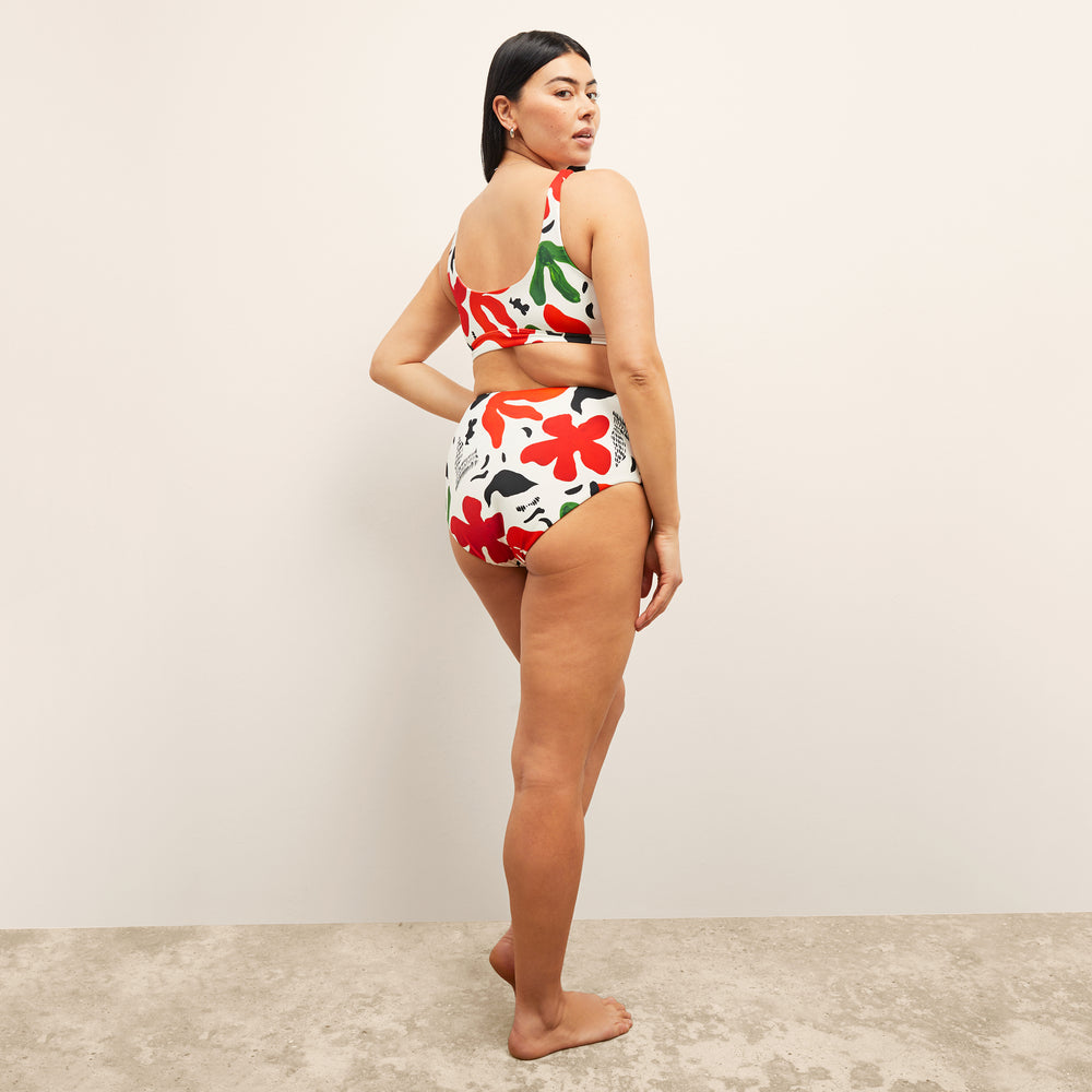back image of a woman wearing the M.M.LaFleurxAndie Ventura Bikini top in Cutout Floral