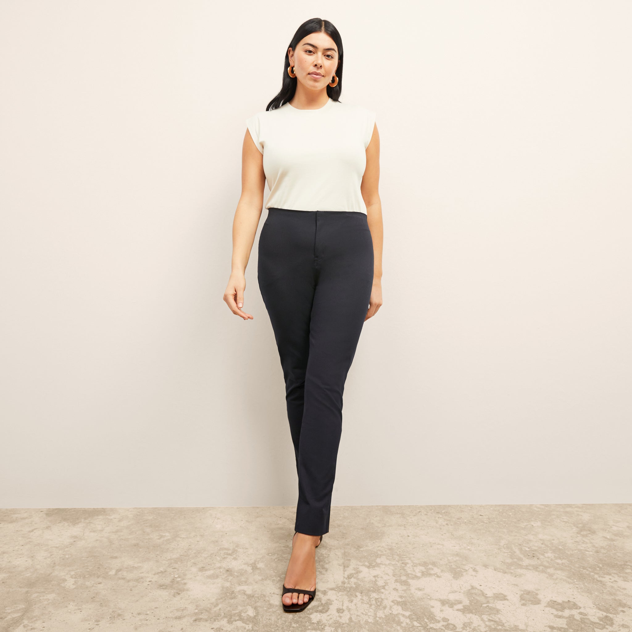 Front image of a woman standing wearing the Hockley pant in ink