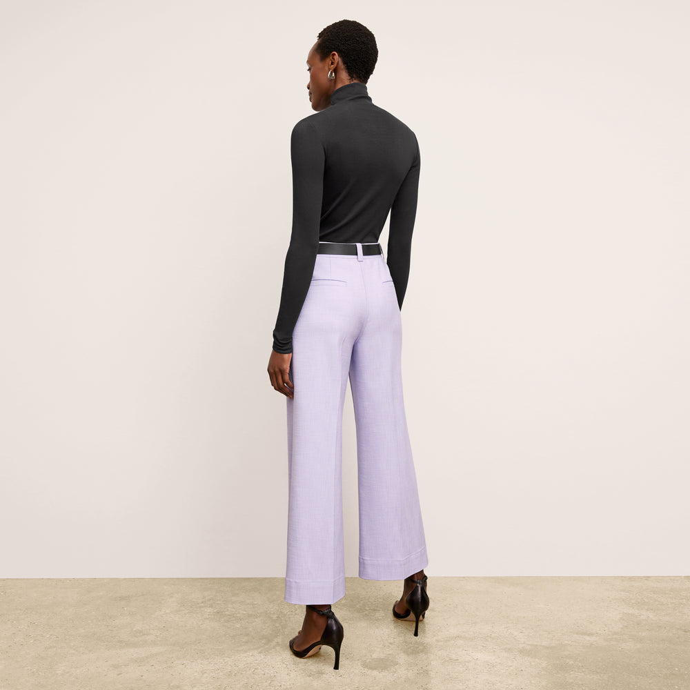 back image of a woman wearing the lani pant in lilac/ivory