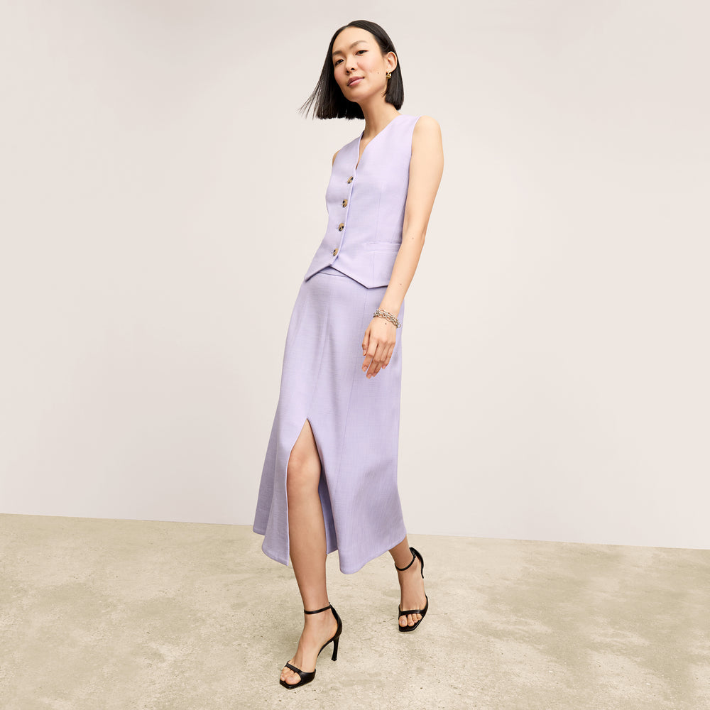 front image of a woman wearing the eva skirt in lilac/ivory
