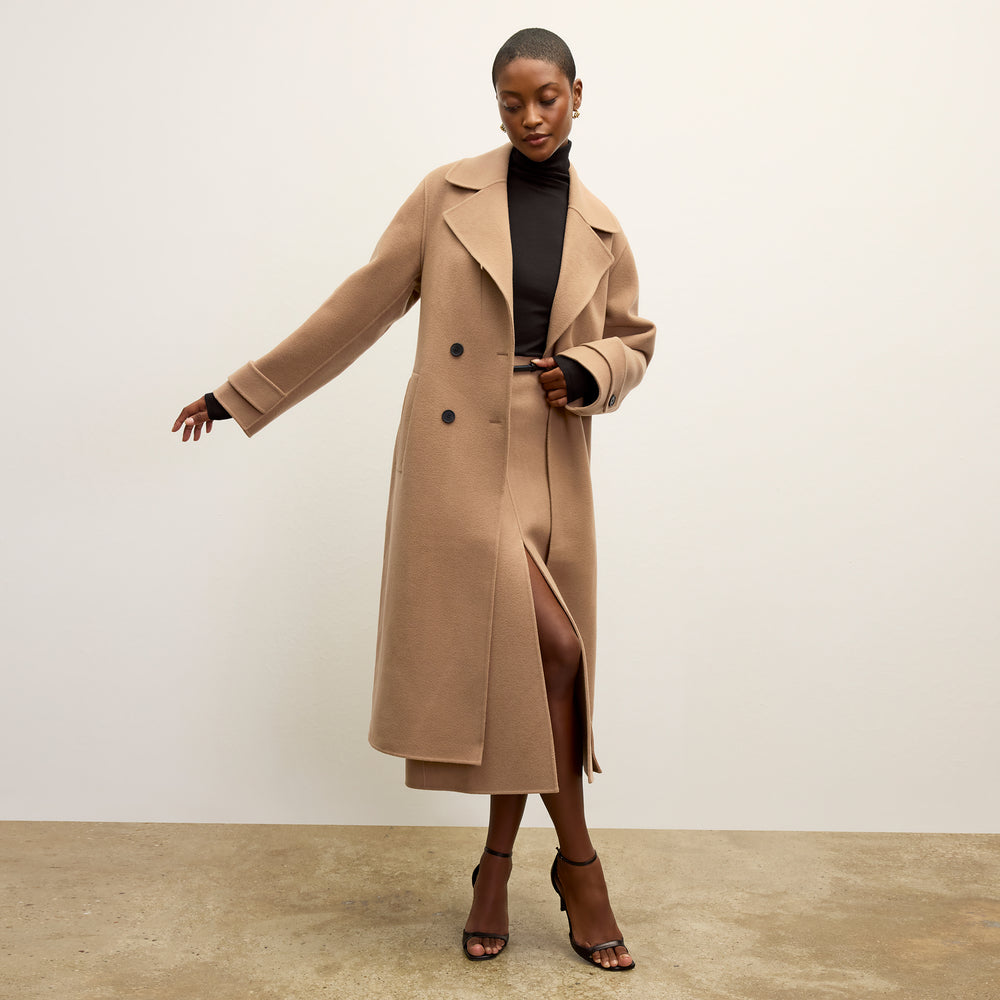 front image of a woman wearing the kerri skirt in camel