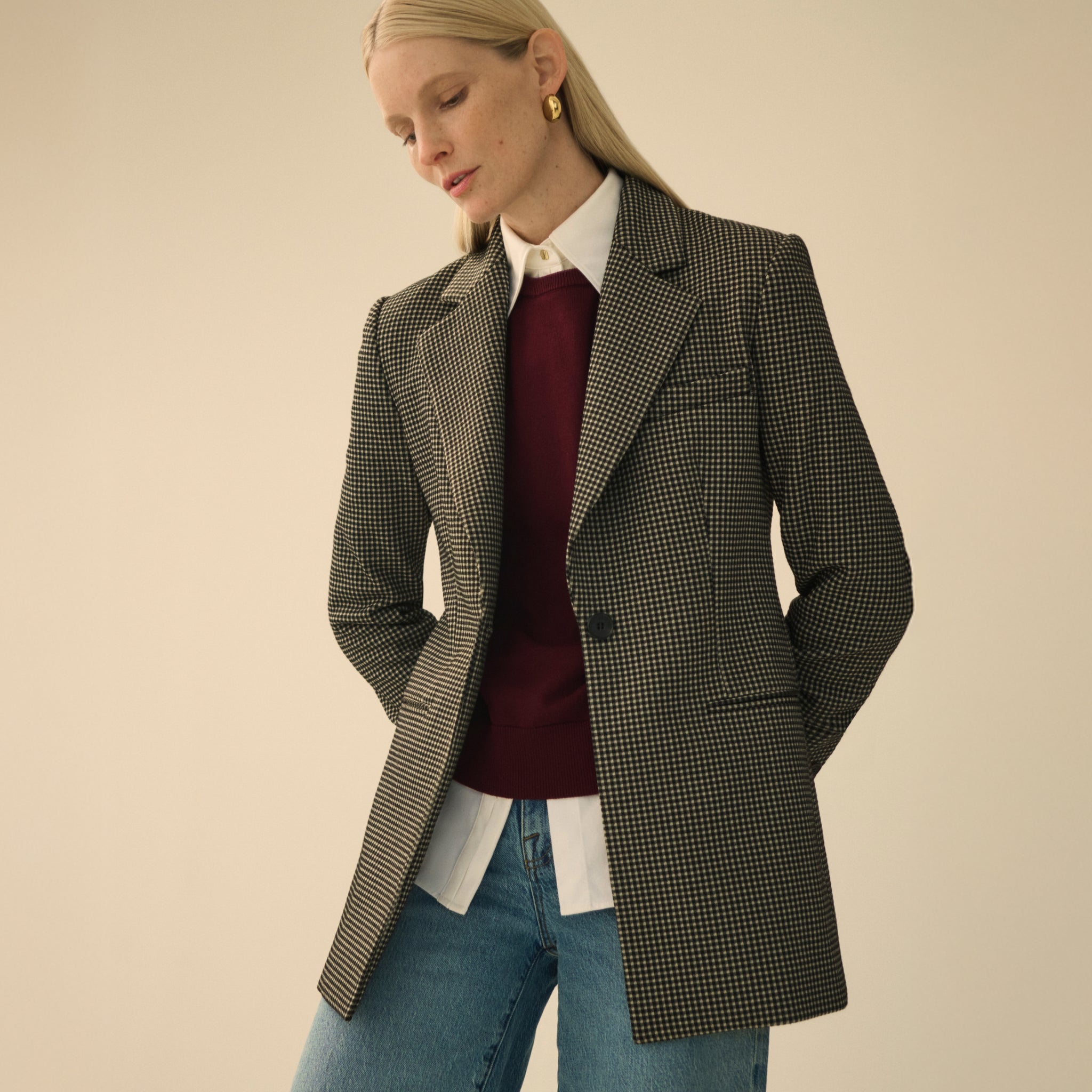 front image of a woman wearing the rossi blazer in classic check