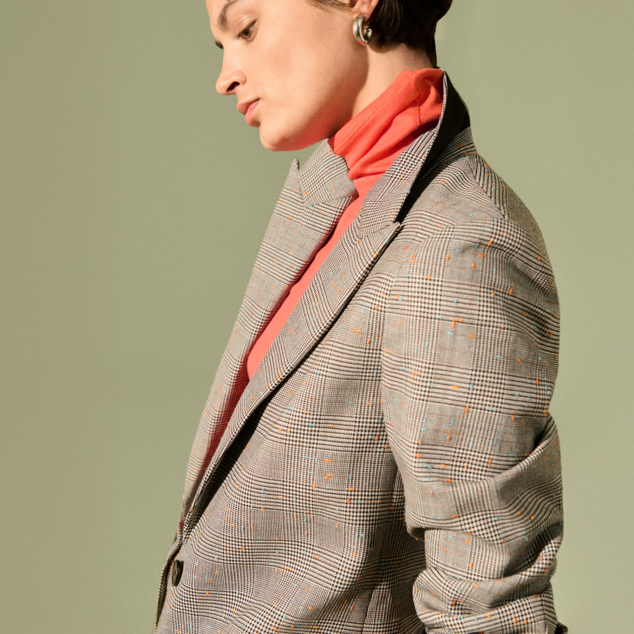 side detail image of a woman wearing the Tyner Blazer in Sharkskin in Mixed Check