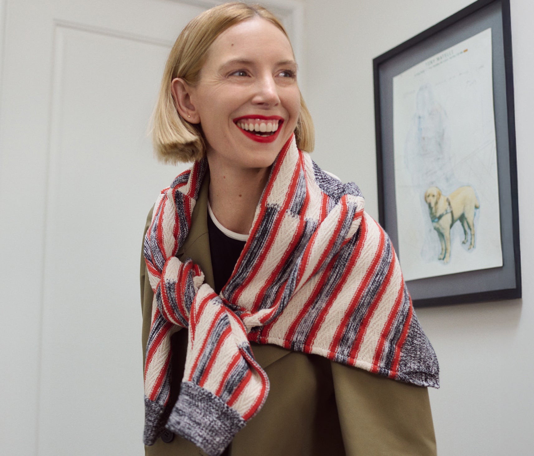 Image of Erin Jennie Pollard at home wearing the Curtis Trench and Miriam Sweater