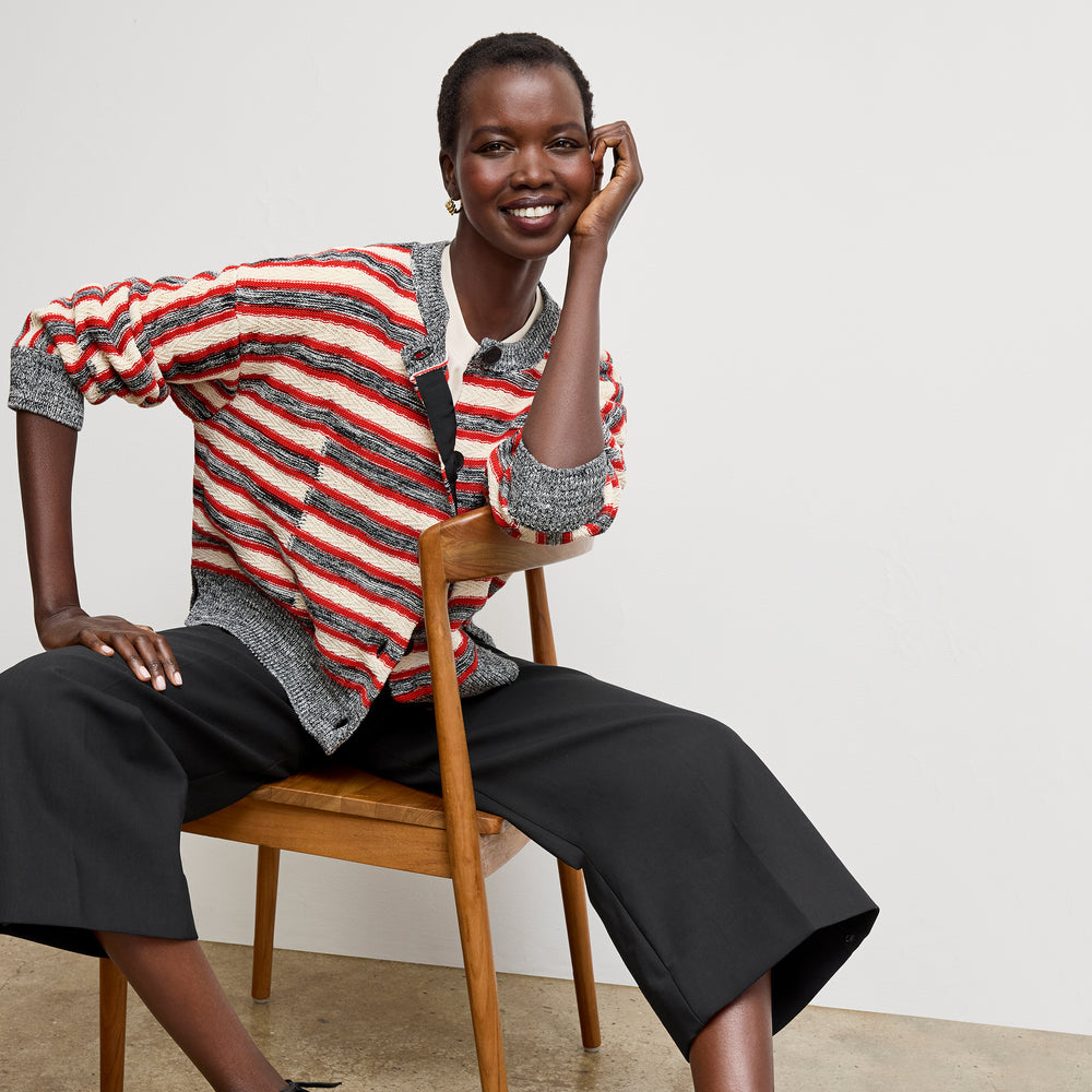 Front image of a woman wearing the adler pant in black