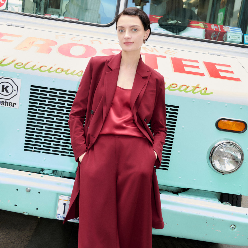 Front image of a woman wearing the Gwynne Dress in Berry Jam