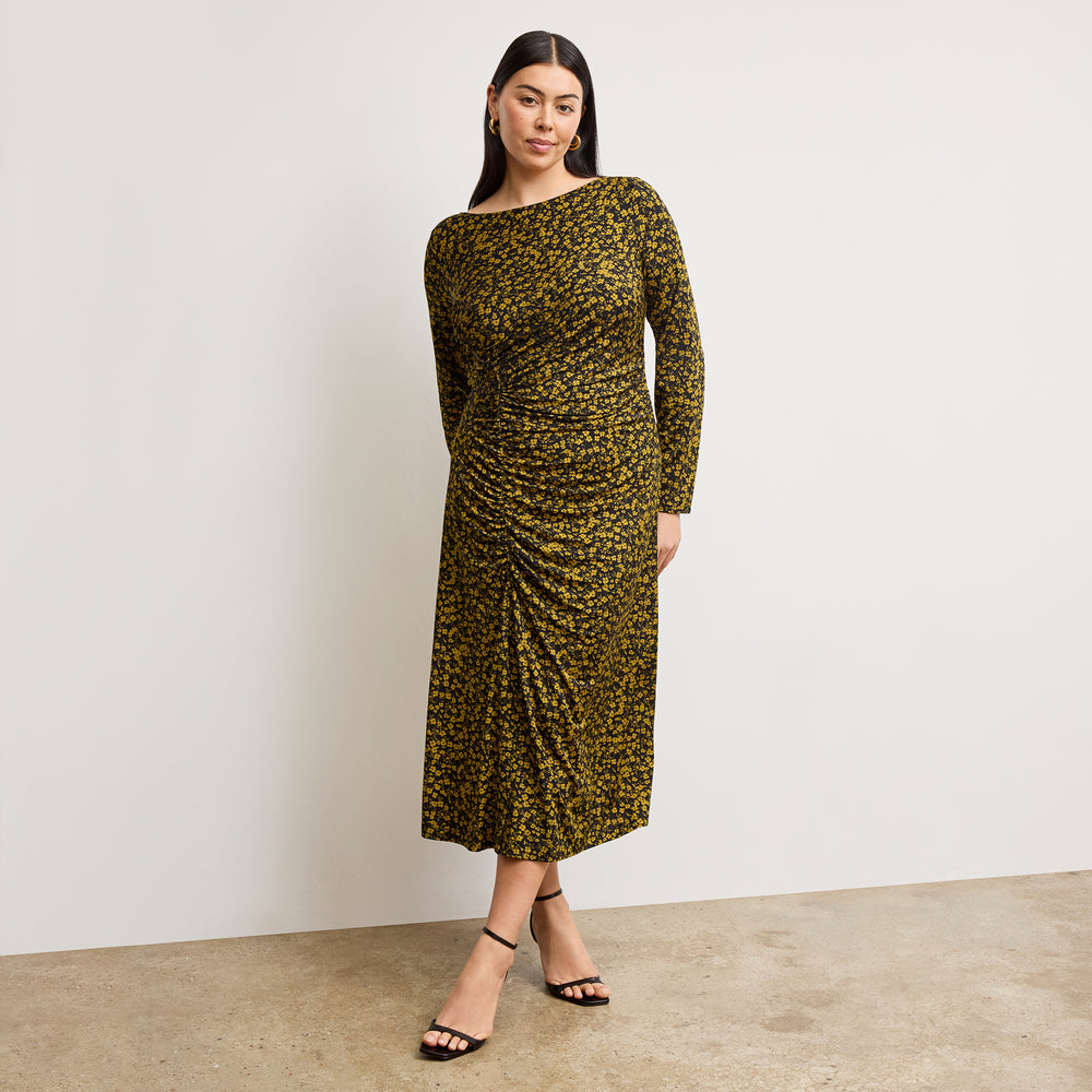 front image of a woman wearing the axam top in bloom print