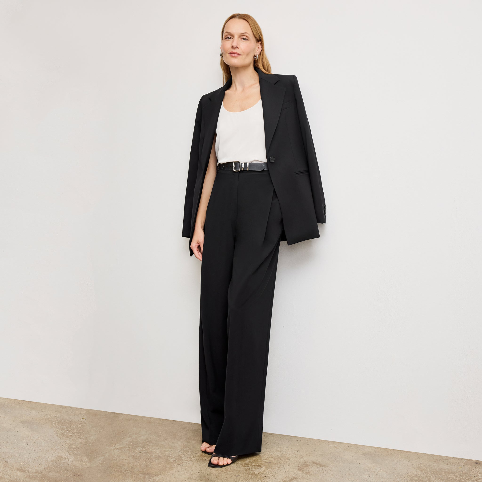 front image of a woman wearing the rossi blazer in black
