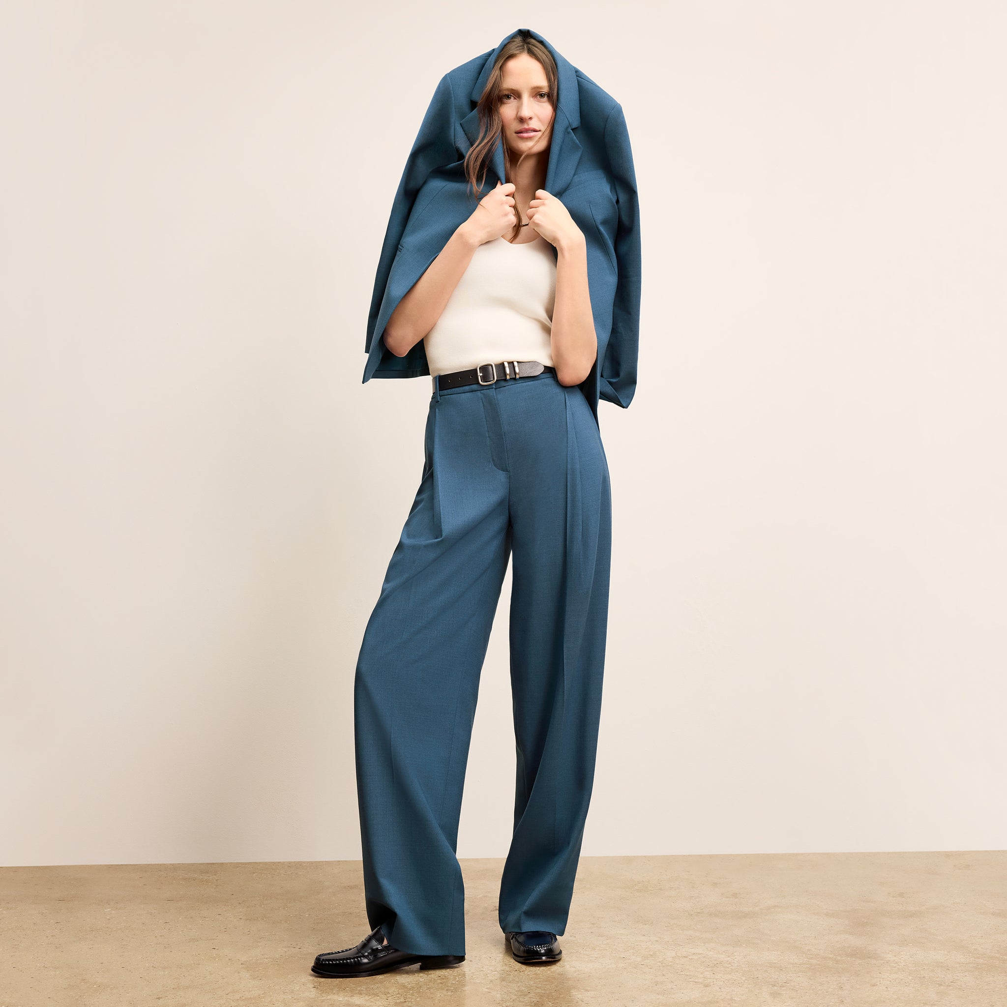 front image of a woman wearing the rossi jacket in bluebell