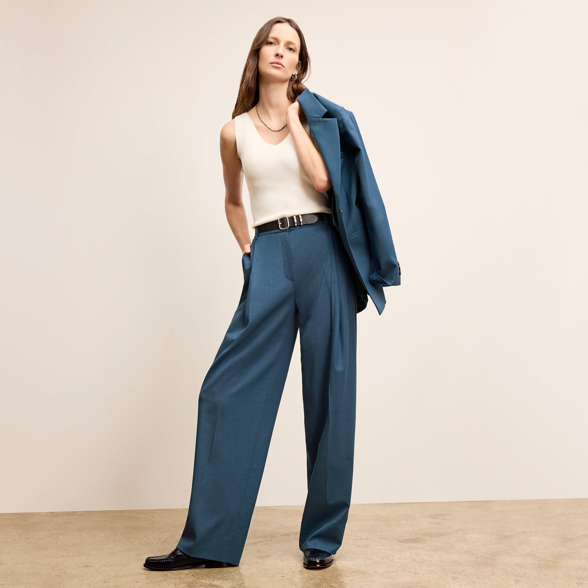 front image of a woman wearing the rossi jacket in bluebell