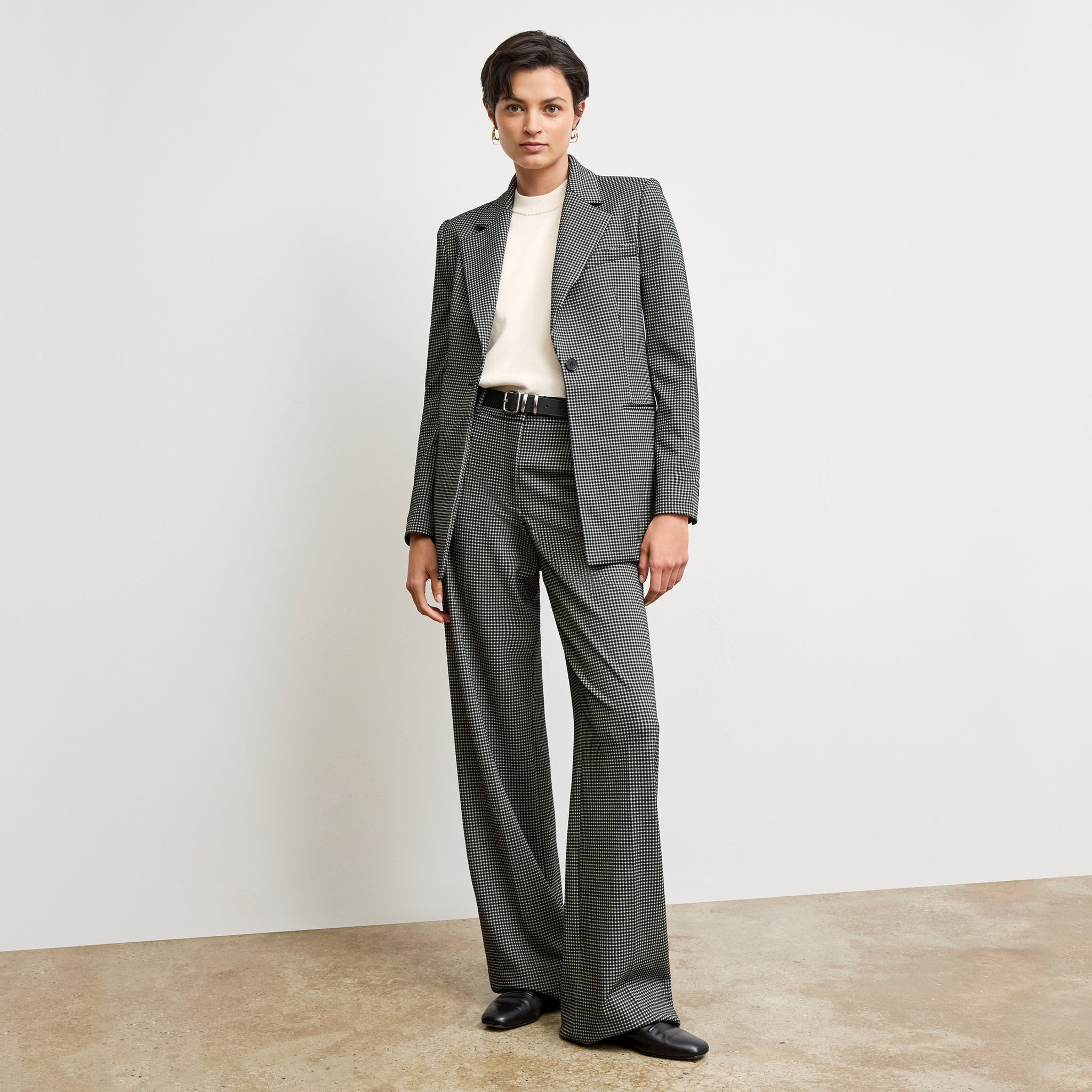 front image of a woman wearing the rossi blazer in classic check
