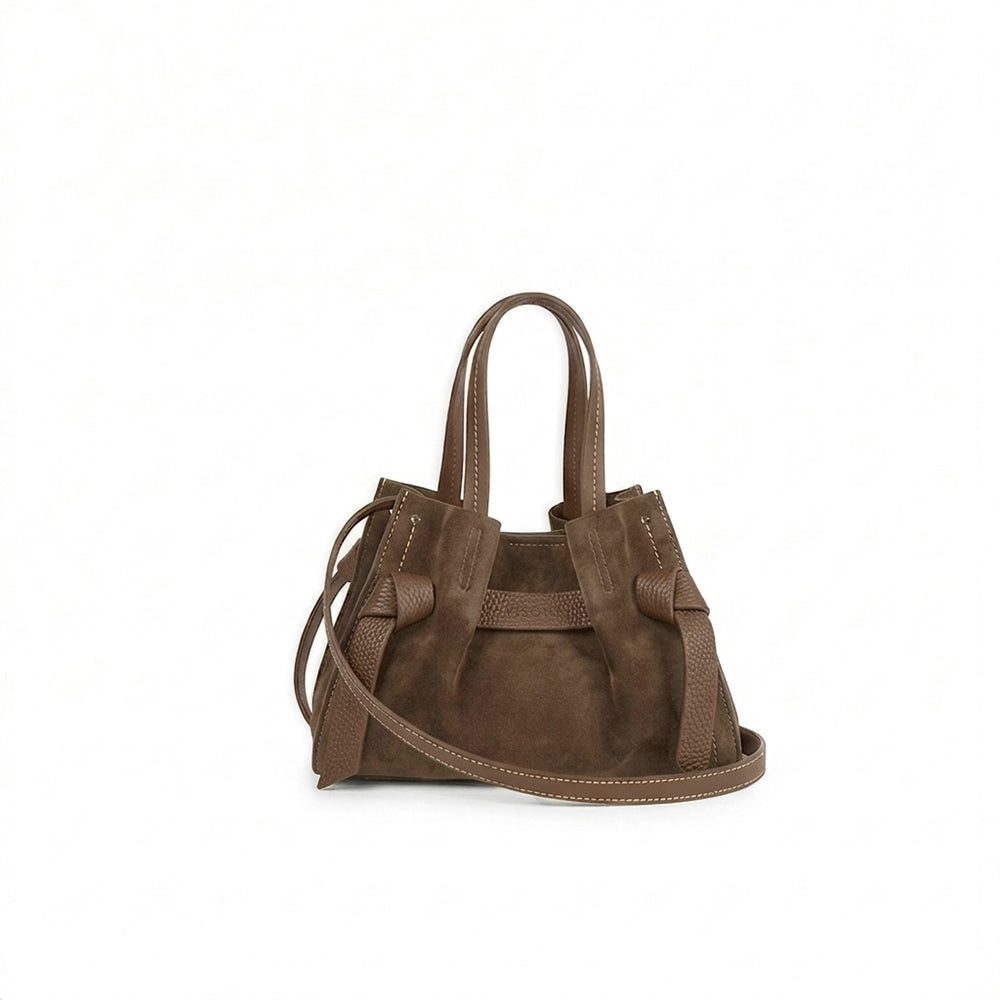 image of a small brown suede bag
