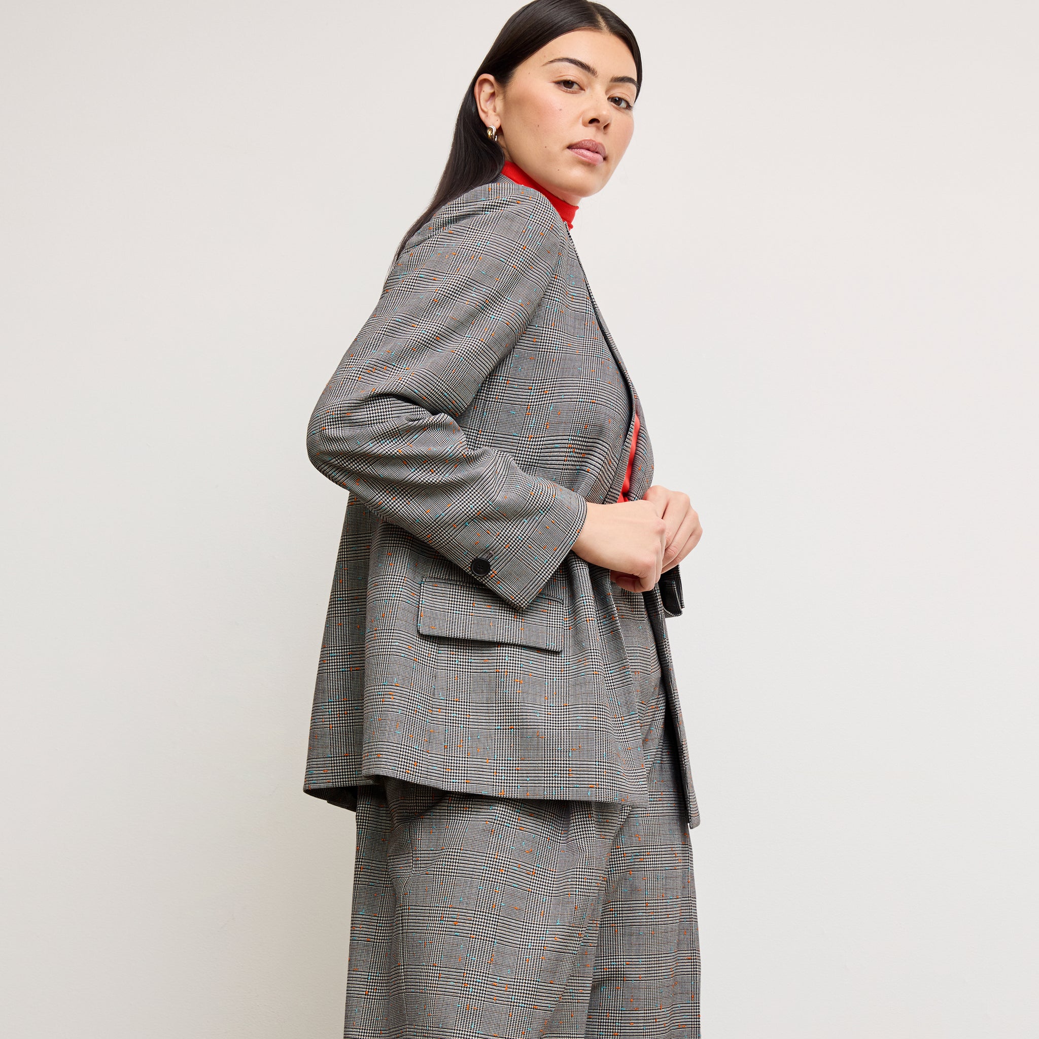 Side image of a woman wearing the Tyner Blazer in Sharkskin in Mixed Check