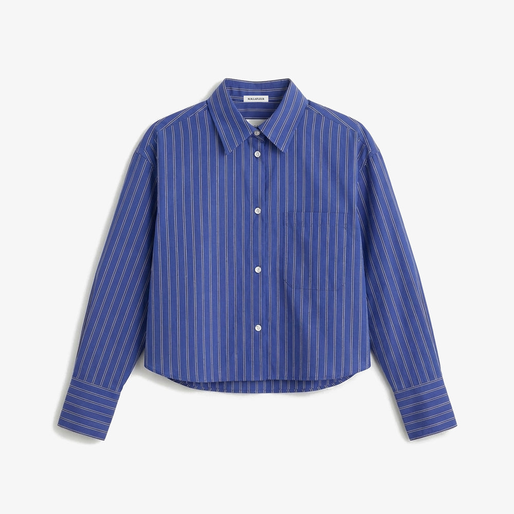 Blue striped shirt on a white background