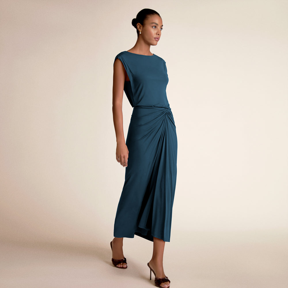 Woman wearing zita dress in moroccan blue