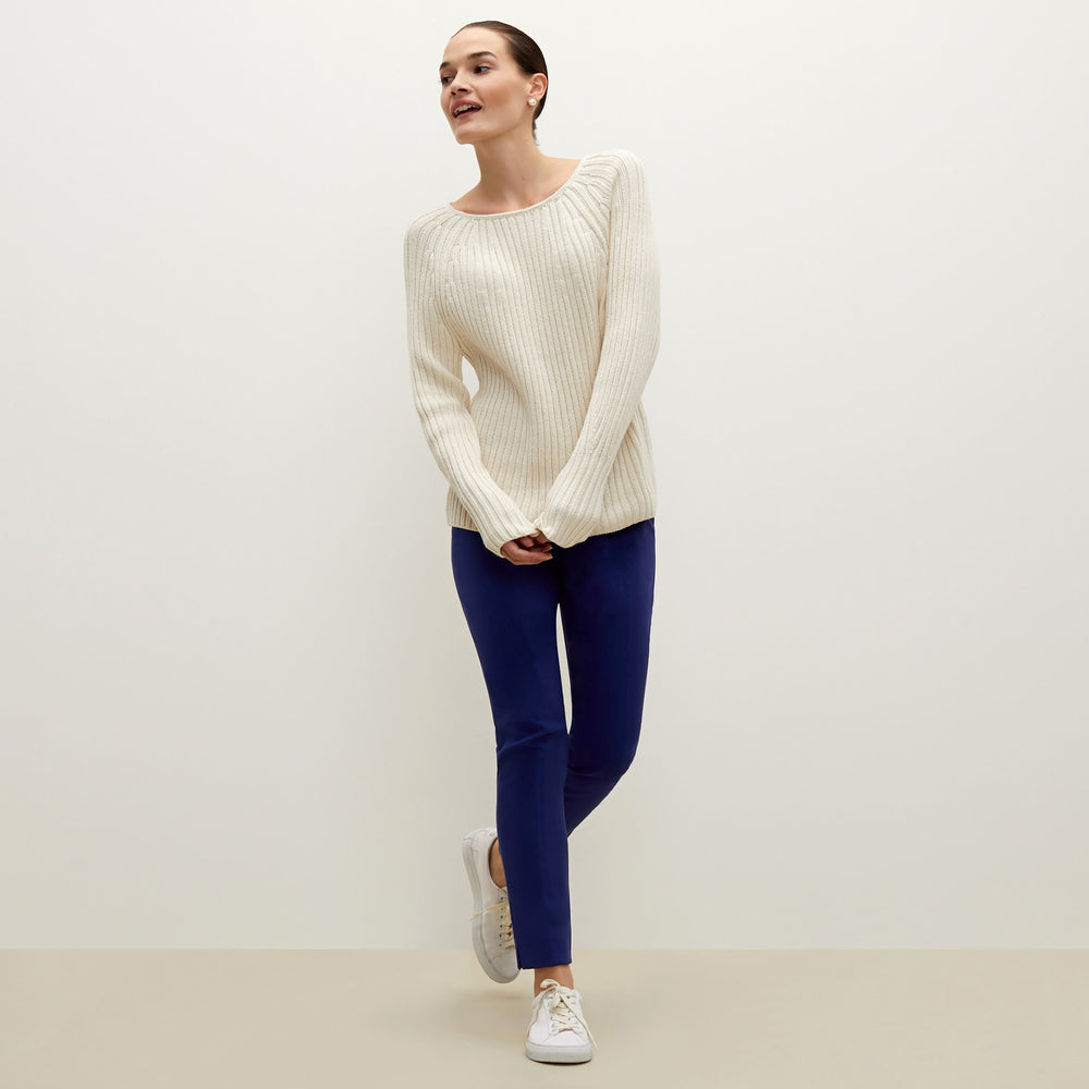 Front image of a woman standing wearing the Marais pant in starry night