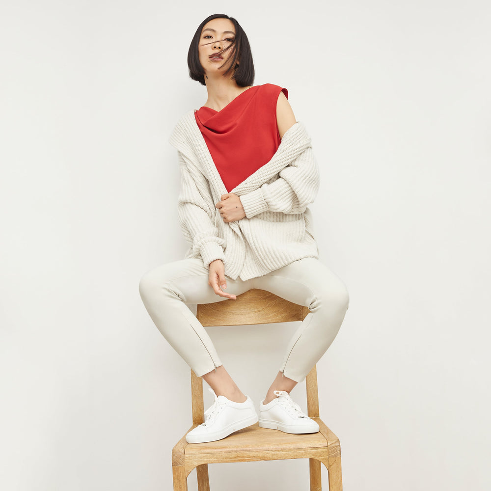 Front image of a woman standing wearing the Snyder Jacket in Ivory
