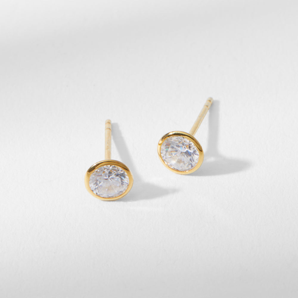 Packshot image of the Bezel Earrings in Gold