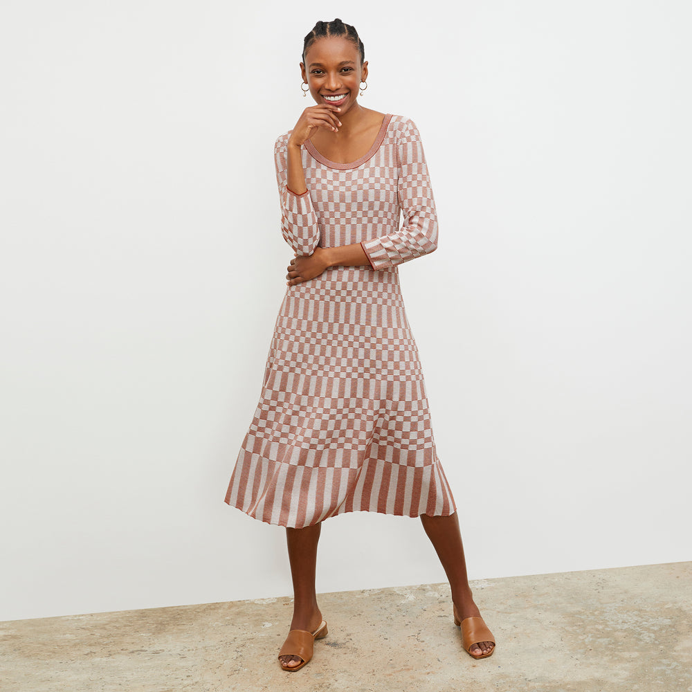 Front image of a woman wearing the Tippy Dress - Checkered Knit in Red Clay / Natural