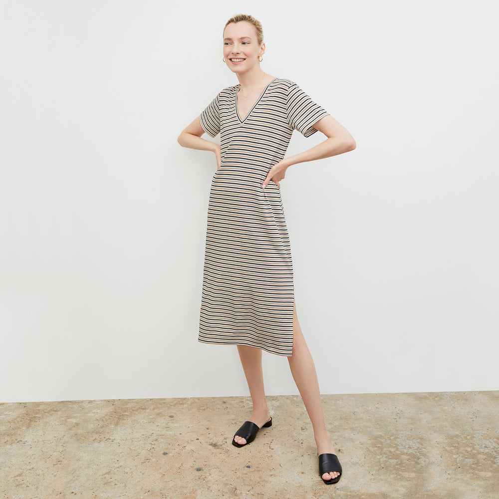 Front image of a woman wearing the Renee Dress - Thin Striped Pima Cotton in Tan / Black