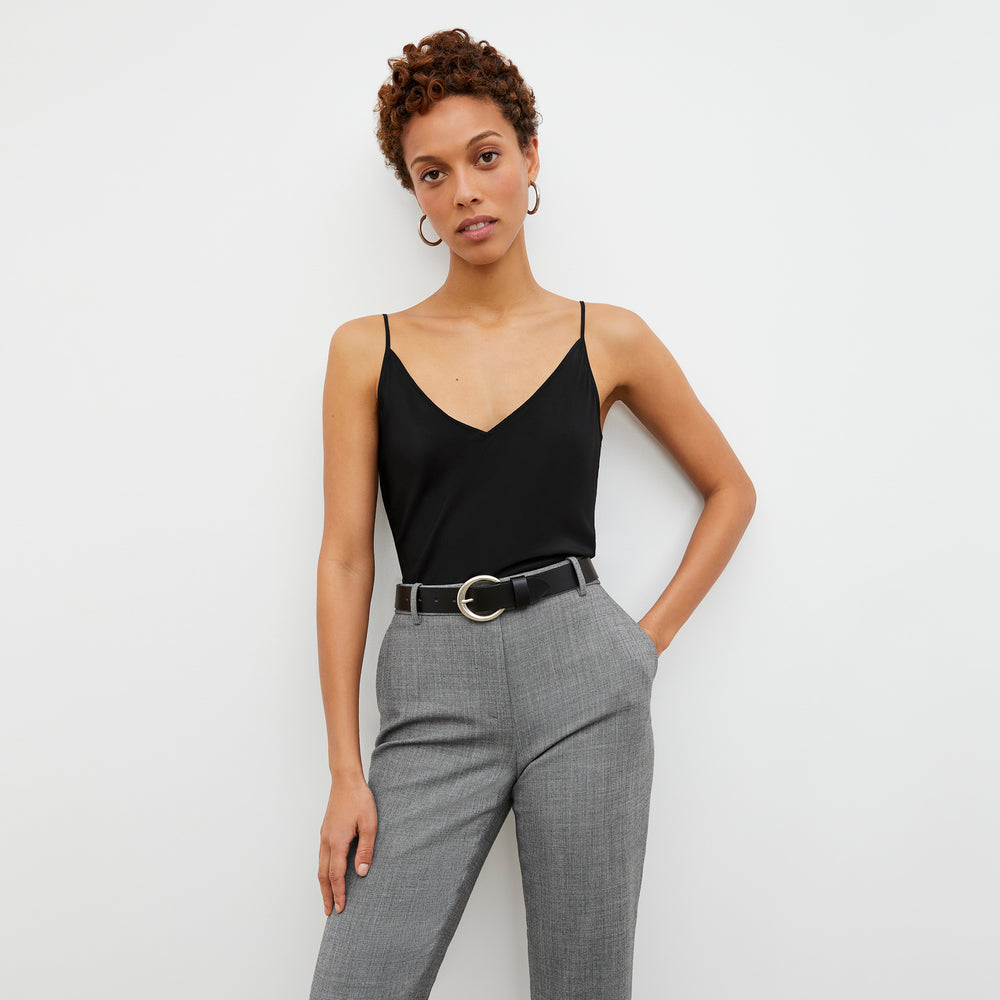 Front image of a woman wearing the Mejia Pant in Black and White Sharkskin