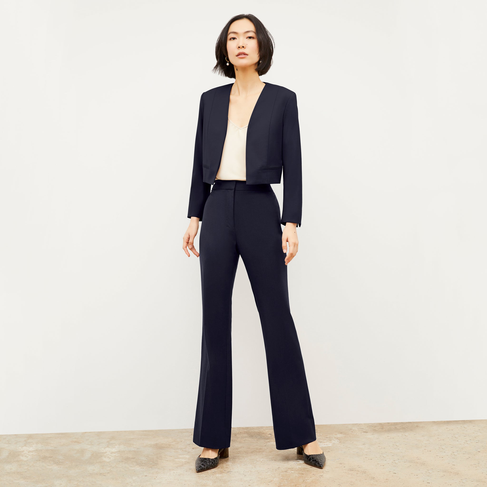 Front image of a woman wearing the Horton pant in Galaxy Blue
