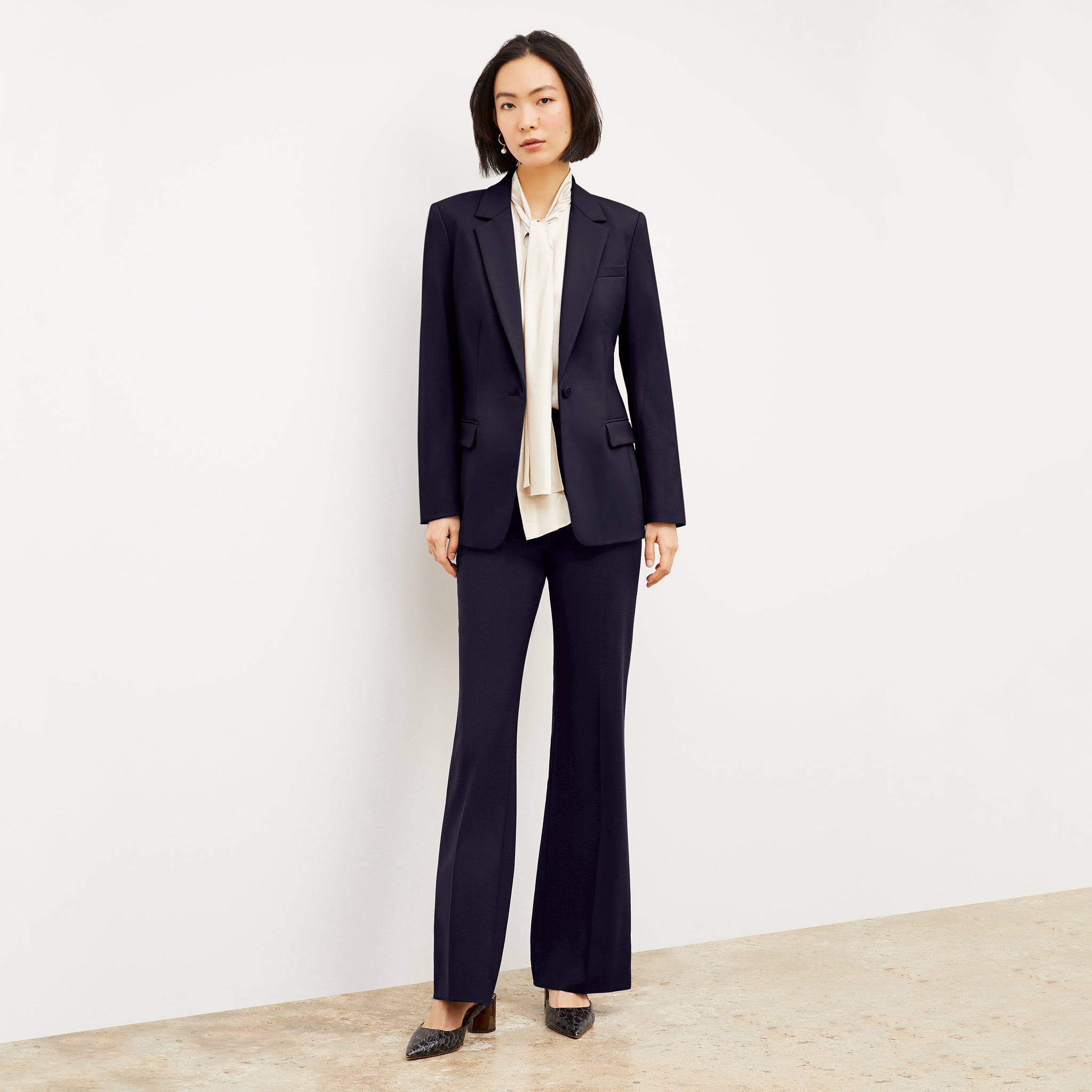 Front image of a woman wearing the Horton pant in Galaxy Blue