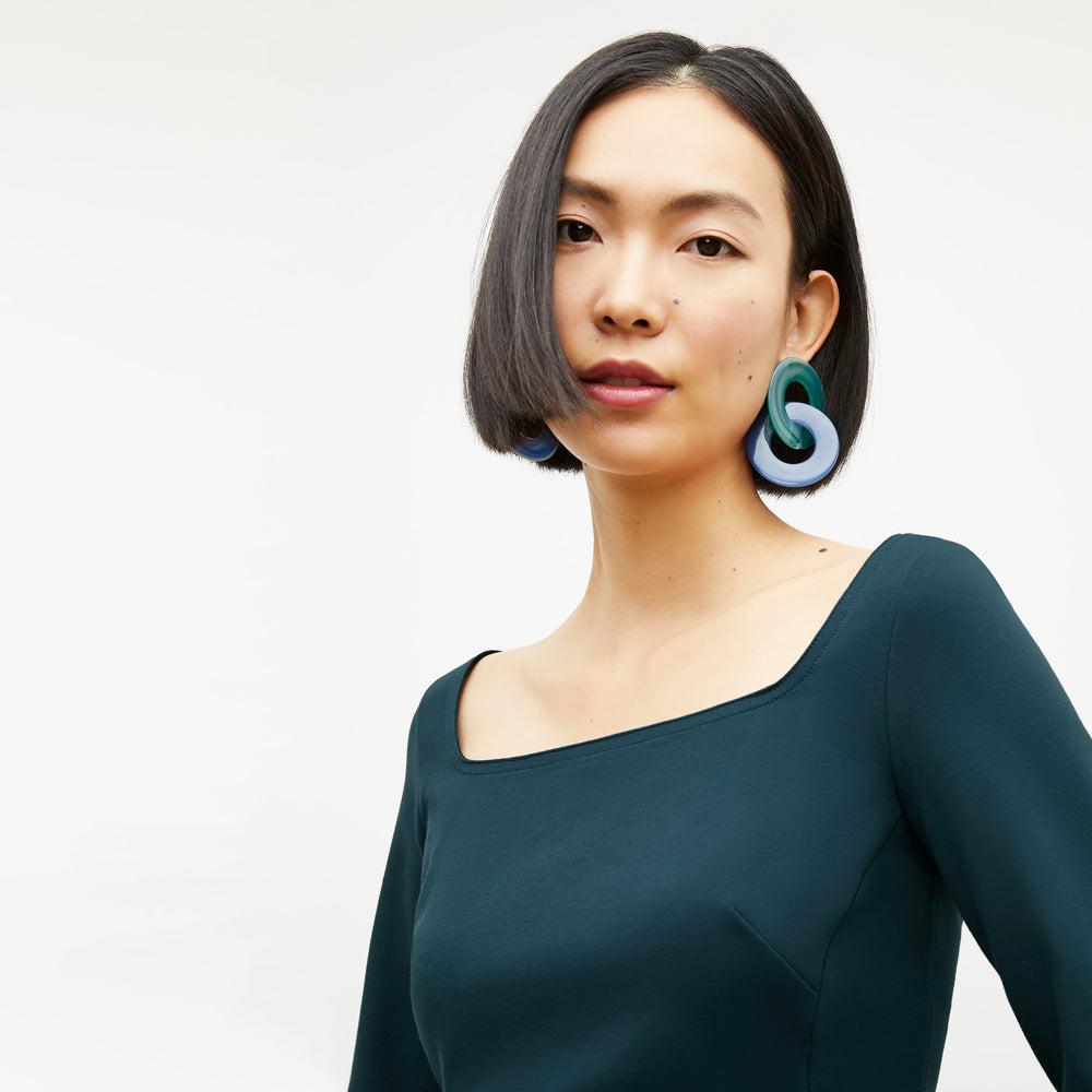 Detail image of a woman wearing the Jace Top in Deep Sea