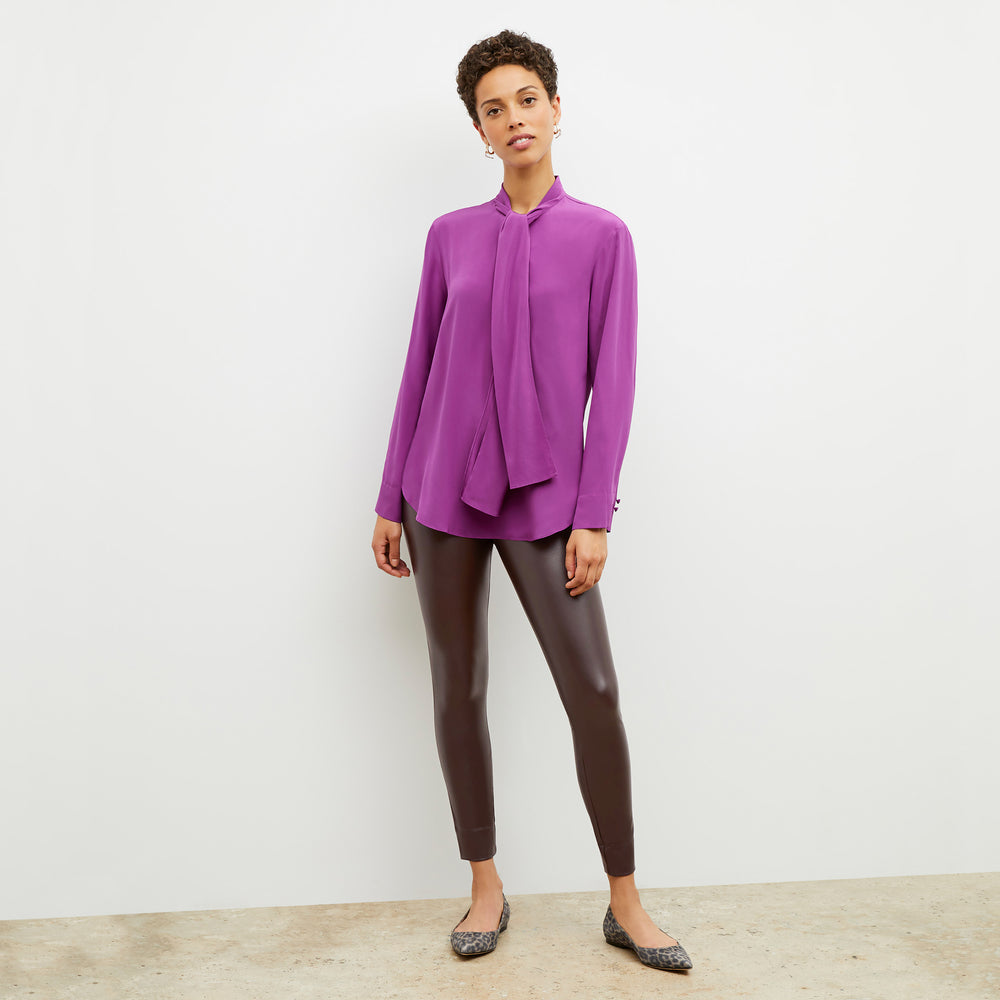 Front image of a woman wearing the Darcy Top in Purple Jasper