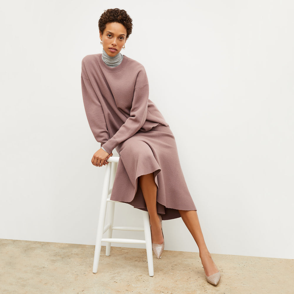 Front image of a woman wearing the leah skirt in rose taupe