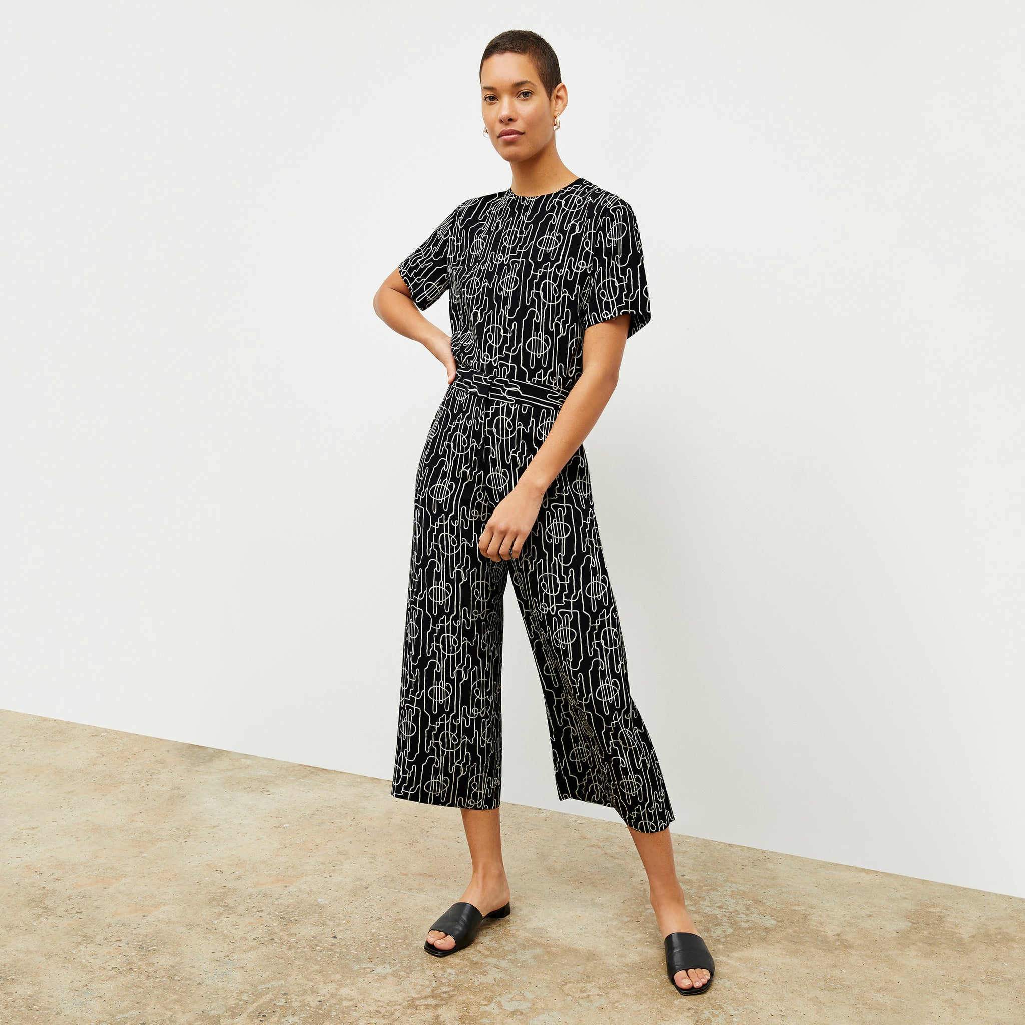 front image of a woman wearing the zhou culotte in symphony print