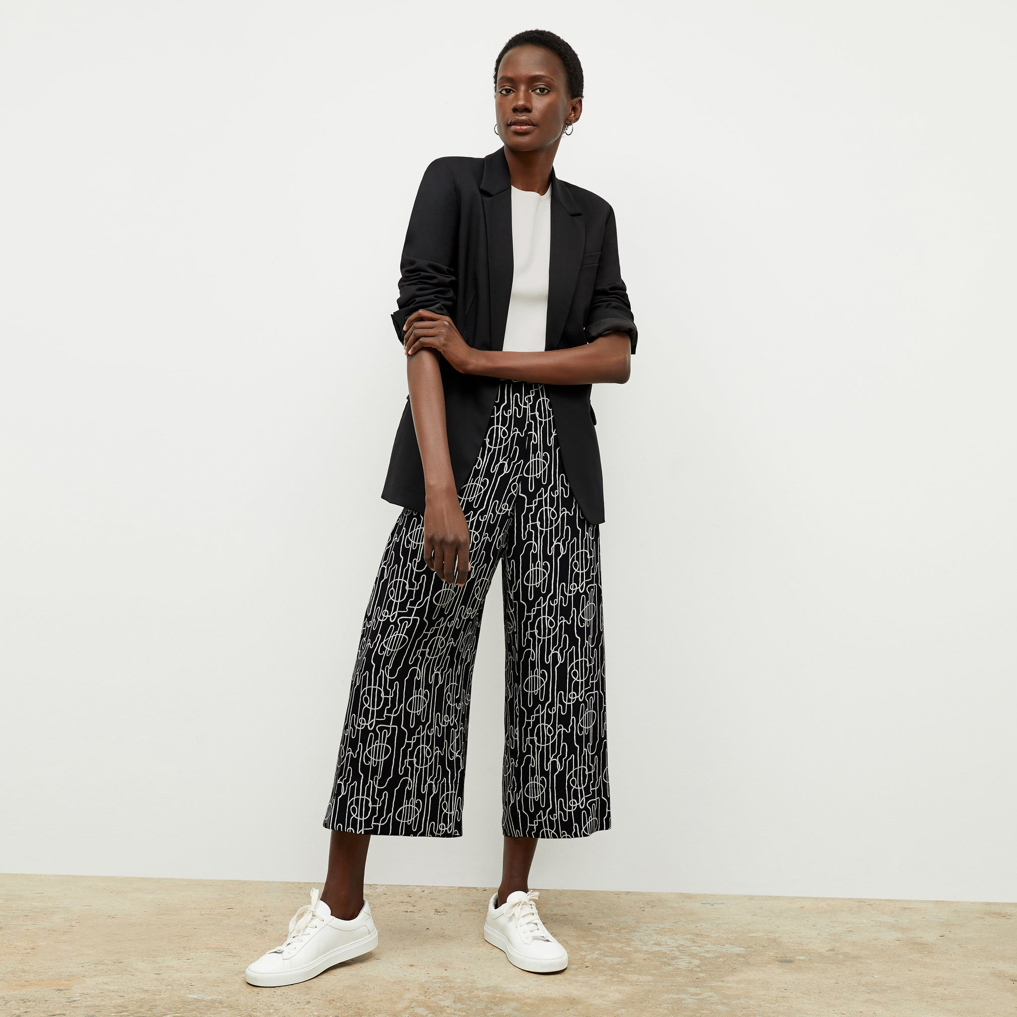 front image of a woman wearing the zhou culotte in symphony print
